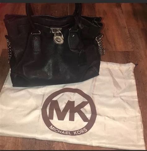 Где можно проверить оригинальность сумки Michael Kors