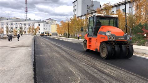 Уплотнение второго слоя асфальта